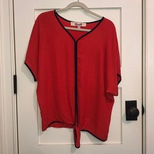 Blouse with knot tie at the bottom